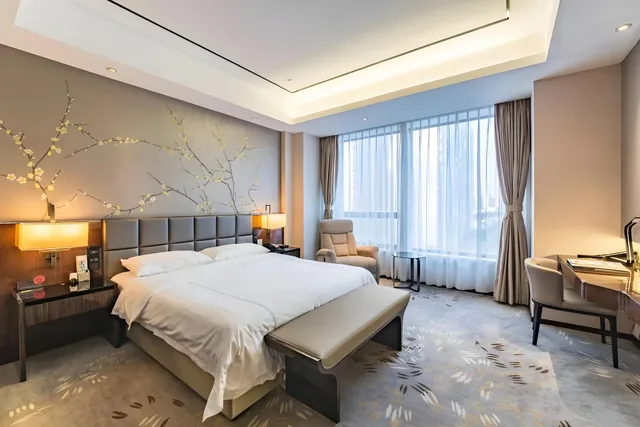 غرفة ديلوكس بسرير كوين، Shuguang International Hotel Huaian 1/2