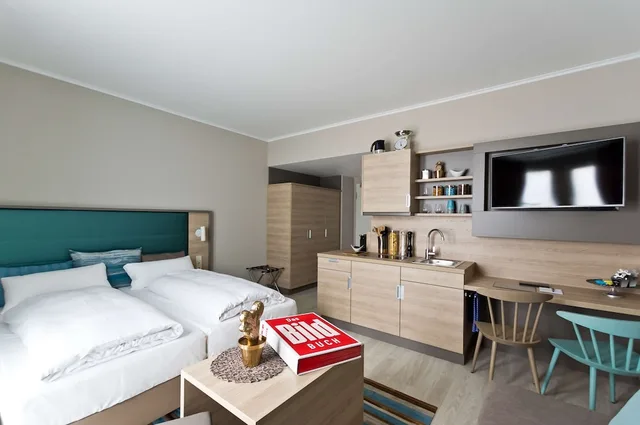 شقة سوبيريور عائلية بسرير مزدوج مع أريكة، elaya hotel stuttgart boeblingen 1/4