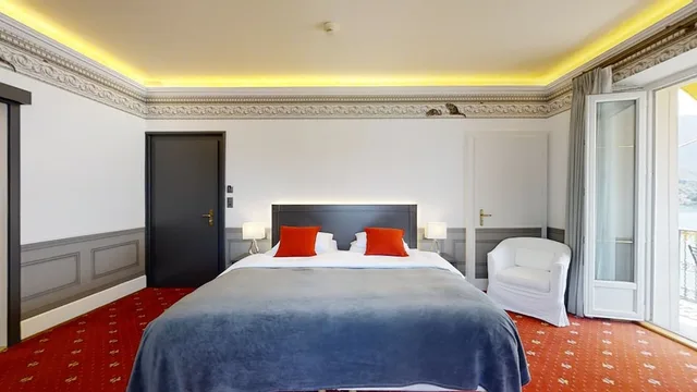 غرفة سوبيريور ديلوكس بسريرين منفصلين بإطلالة على البحيرة بشرفة، GOLF HOTEL RENE CAPT 3/5