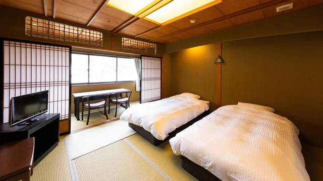 غرفة بسريرين منفصلين بأرضية تاتامي، Takeo Onsen Kanko Hotel Kyotoya 1/1