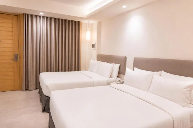 غرفة بريميوم رباعية، Mandarin White Sand Boracay 2/6
