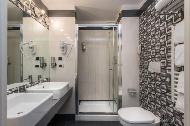 غرفة ديلوكس بسرير كوين، Noba Hotel e Residenze 3/4