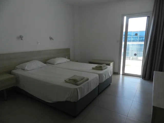 شقة ديلوكس بثلاثة أسرّة بغرفة نوم واحدة مع أريكة، Evabelle Napa Hotel Apartments 1/4