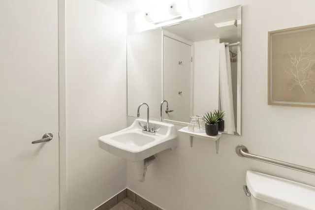 Suite, Queen Bed, Sofa, Kitchen, Hotel Saint Laurent Montreal 9/10