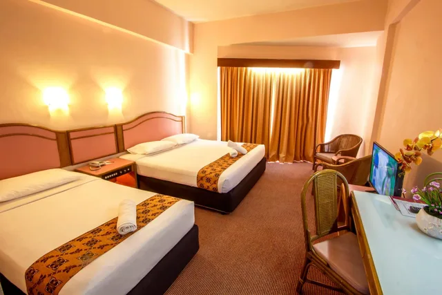 غرفة ديلوكس ثلاثية بسرير فردي، Hotel Grand Continental Langkawi 5/8