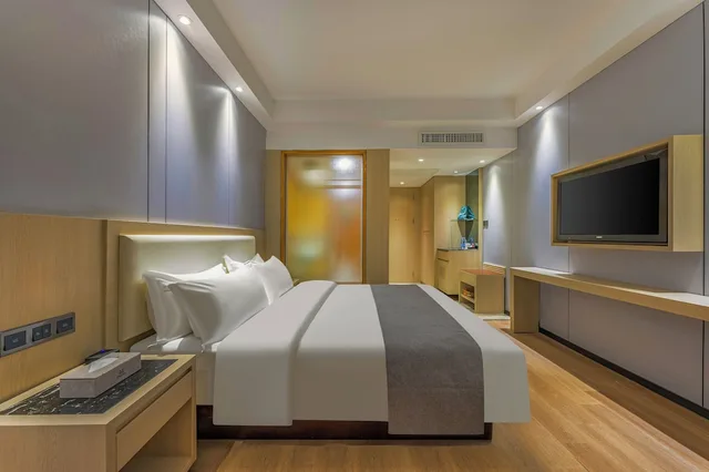 غرفة بزنس بسرير كوين، Meihao Mingyue Hotel International Finance City Keyun Road Metro Branch 5/10