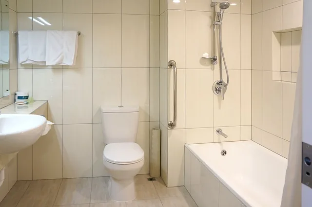 غرفة قياسية بسرير كوين وسرير فردي، The Victoria Hotel Dunedin 3/3