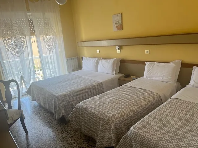 غرفة بريميوم رباعية بسرير كوين وسريرين منفصلين، Bergamo 1/2