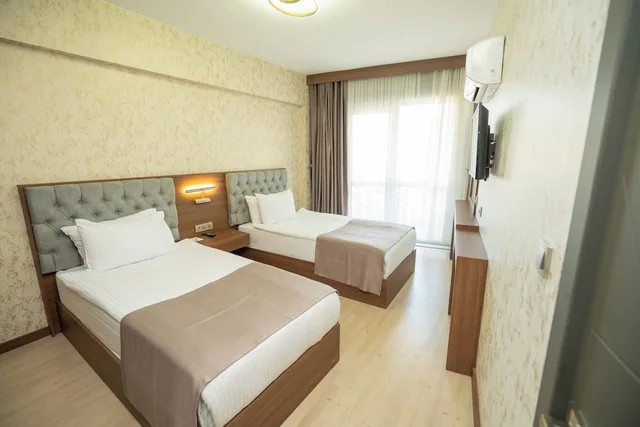 جناح غراند بسرير كوين وسريرين منفصلين، Grand Salizze Hotel 1/9
