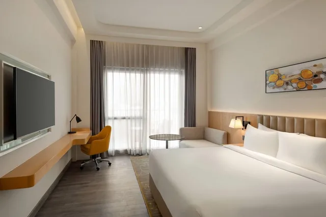 غرفة ديلوكس بسرير كينج، Ramada by Wyndham Sonipat Murthal 1/4