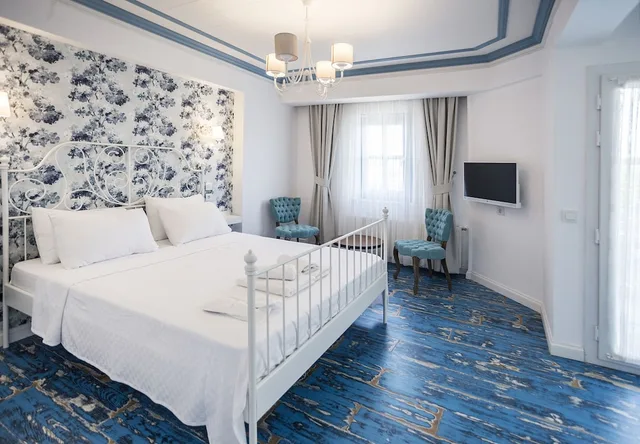 غرفة ديلوكس بسرير كوين بشرفة بإطلالة جزئية على البحر، Sardunya Hotel 1/4