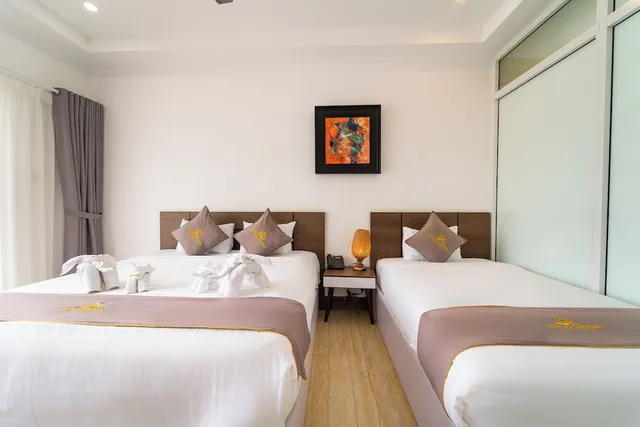 غرفة سوبيريور ثلاثية بسرير مزدوج وسرير فردي، Lotus Garden Resort 4/7
