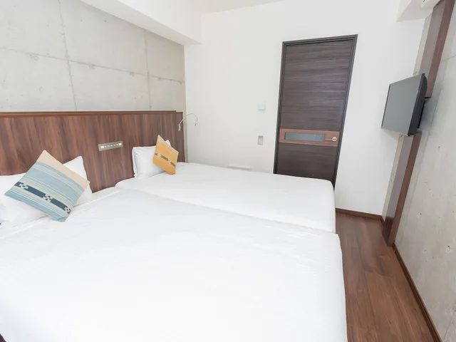 Room, Twin Beds, 2 Futon Beds, Tatami, Condo Building, Kitchen, Lounge Access، The Breakfast Hotel Porto Ishigaki 4/10