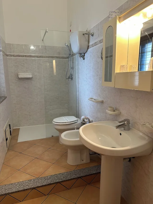 شقة بسرير مزدوج بإطلالة على الحديقة بغرفة نوم واحدة مع أريكة، Residence Hotel La Taverna 1/2