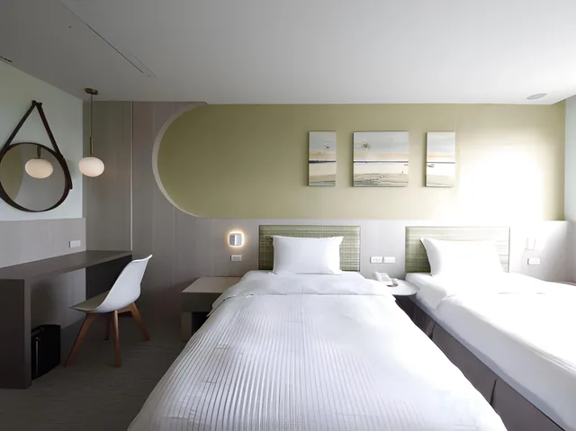 غرفة ديلوكس بسرير كوين، Haifu Hotel And Suites 1/4