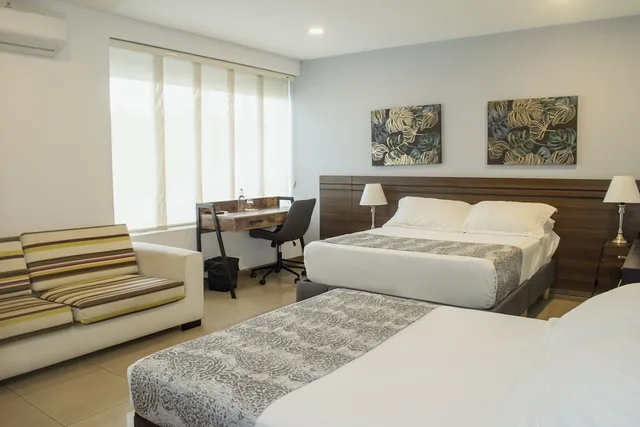 غرفة قياسية بسريرين منفصلين وسرير كوين، Malik Hotel Boutique 9/10