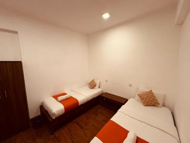 غرفة بسريرين منفصلين بحمام مشترك، CityRest Fort 2/6