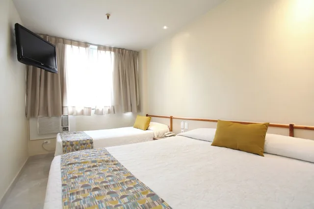 غرفة قياسية ثلاثية بثلاثة أسرّة، Mengo Palace Hotel 4/8