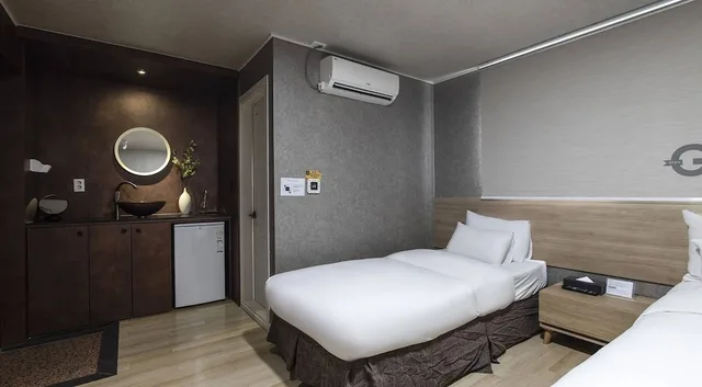 غرفة عائلية بسرير مزدوج وسرير فردي بإطلالة على المدينة، Malu Hotel 8/10