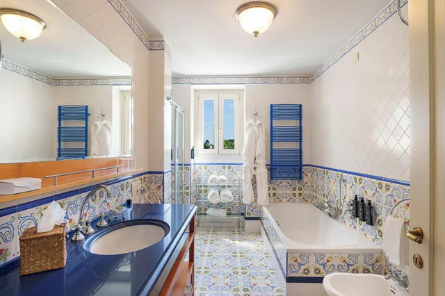 غرفة بريميير ثلاثية بسرير مزدوج أو سريرين منفصلين بشرفة، Manzi Hotel & Spa 2/2
