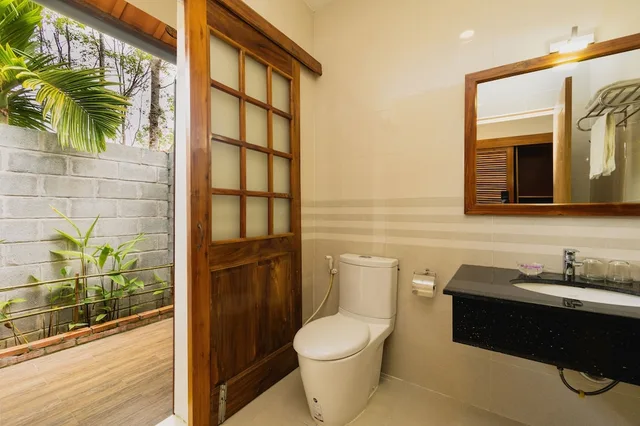 غرفة ديلوكس بسريرين منفصلين بإطلالة على الحديقة، The Garden House Phu Quoc 4/10