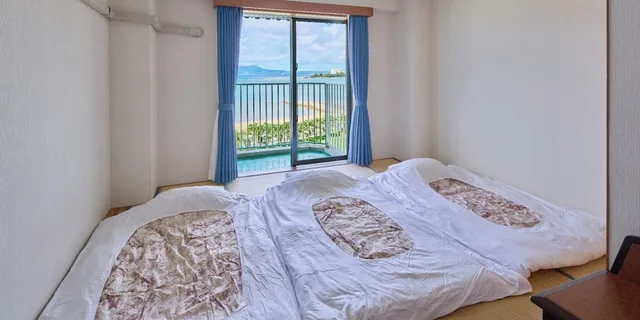 غرفة يابانية غربية بسريرين منفصلين بإطلالة على البحر في الطابق العلوي، Miyuki Hamabaru Resort 1/2