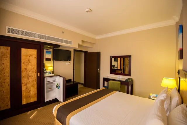 غرفة قياسية بسرير كينج، Caesar Hotel Oman 4/7