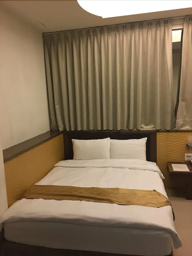 غرفة ديلوكس رباعية بسريرين مزدوجين، Ri Yue Hu Pan Hotel 2/4