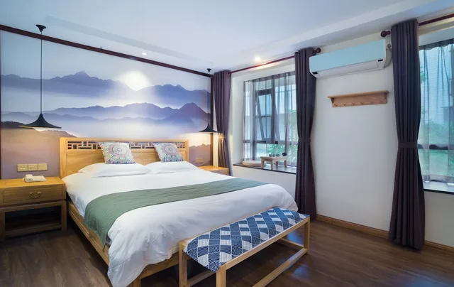 غرفة ديلوكس بسرير كوين، Riverside Inn Guilin Central 3/5