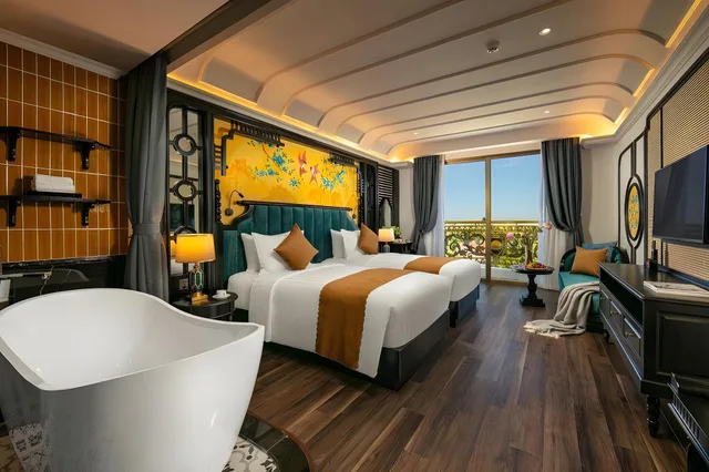 غرفة بريميير بسريرين مزدوجين، Grand Sunrise Palace Hoi An 1/1