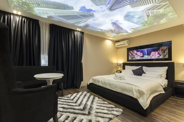 غرفة اقتصادية بسرير كوين، Madison Rooms 1/9