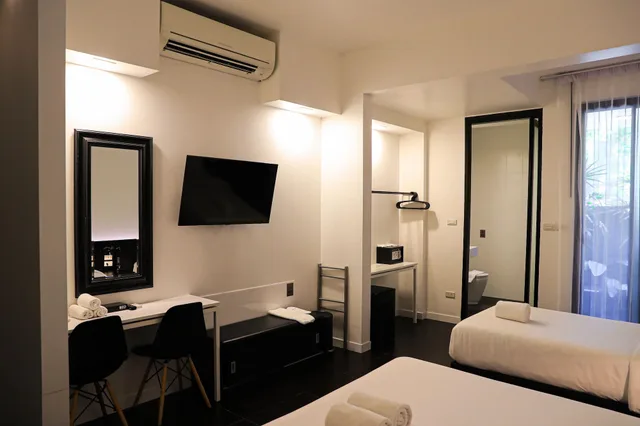 Room, Triple, 1 Double and 1 Single Bed, Adult Only، Bed Phrasingh Hotel Adults Only 1/3