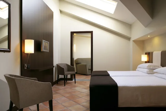 Room, Double Bed, Small, Attic، Th Roma Carpegna Palace 1/6