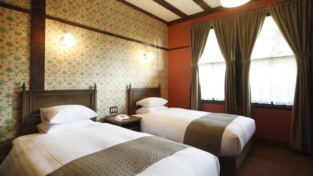 غرفة قياسية بسريرين منفصلين، Unzen Kanko Hotel 1/2