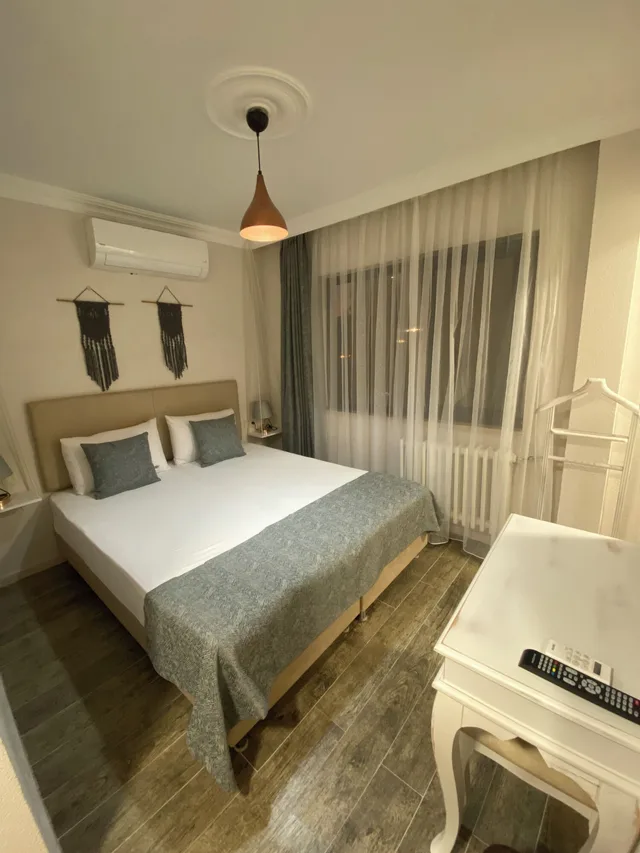 غرفة قياسية بسريرين منفصلين، Kale Motel 1/9