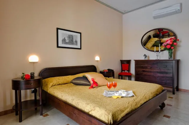 غرفة ديلوكس بسرير كوين وسرير فردي، Tenuta La Baronessa 1/5