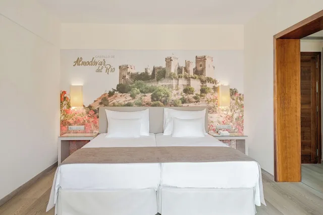 غرفة بسريرين منفصلين بإطلالة جزئية على البحر، Vila Gale Isla Canela 8/10