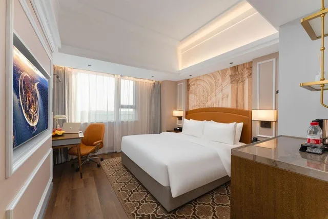 غرفة قياسية بسرير كوين، Vienna International Hotel (Shanghai National Exhibition and Convention Center Cao'an Road) 1/1