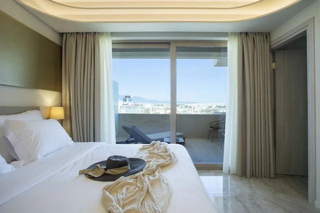 جناح سيغنتشر بسرير كينج، Green Suites Boutique Hotel 1/10