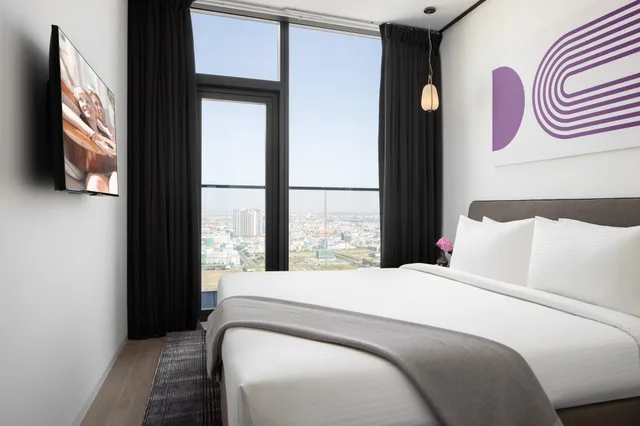 غرفة بريميير بسرير كينج وسرير كوين وسريرين منفصلين بـ3 غرف نوم، Citadines Flatiron Phnom Penh 2/8