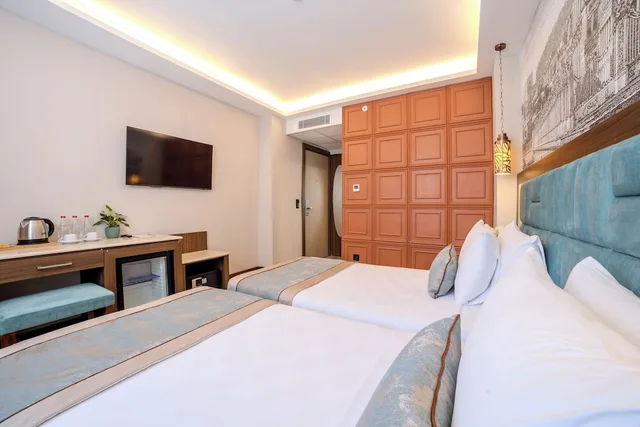 غرفة قياسية بسرير مزدوج وسرير فردي، Grand Hilarium Hotel 7/10