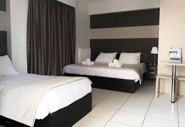 Deluxe, Triple, 1 King and 1 Single Beds, Mc Queen Hotel 4/5