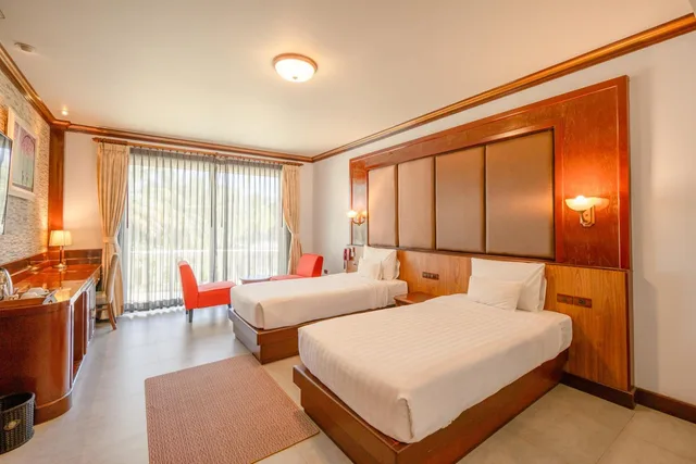 جناح جونيور بسريرين منفصلين بشرفة، Erawan Hotel 3/10