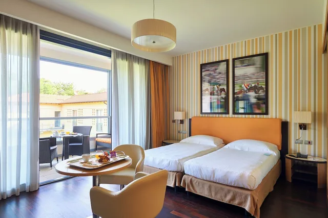 غرفة ديلوكس بسرير كوين، Unahotels Varese 3/10