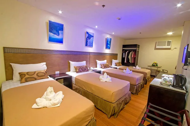 غرفة ديلوكس رباعية، Fersal Hotel Puerto Princesa 3/6