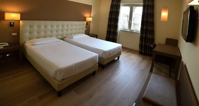 غرفة بسريرين منفصلين، Best Western Grand Htl Guinigi 2/5