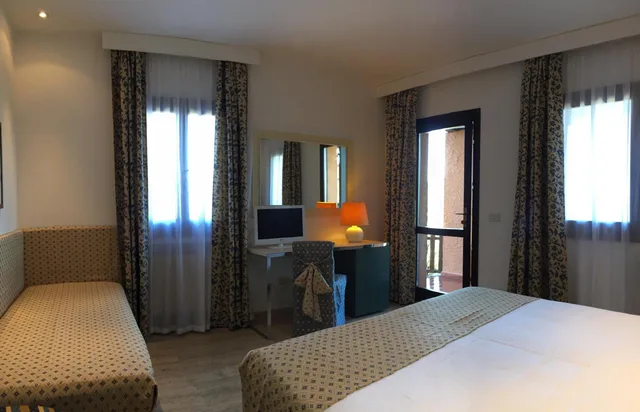 غرفة ثلاثية بإطلالة على البحر، Resort Le Picchiaie 3/3