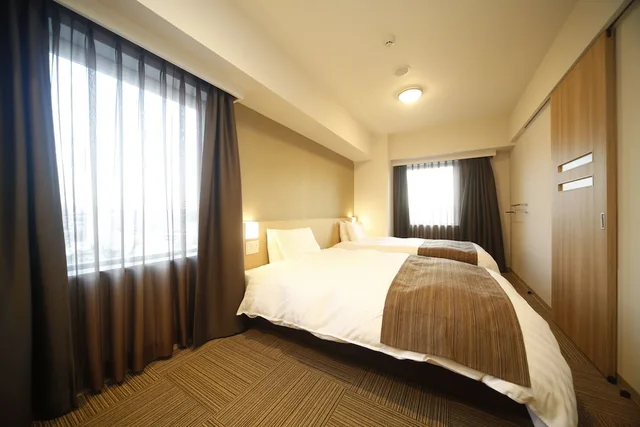 غرفة بسريرين منفصلين، DORMY INN HONHACHINOHE 2/4