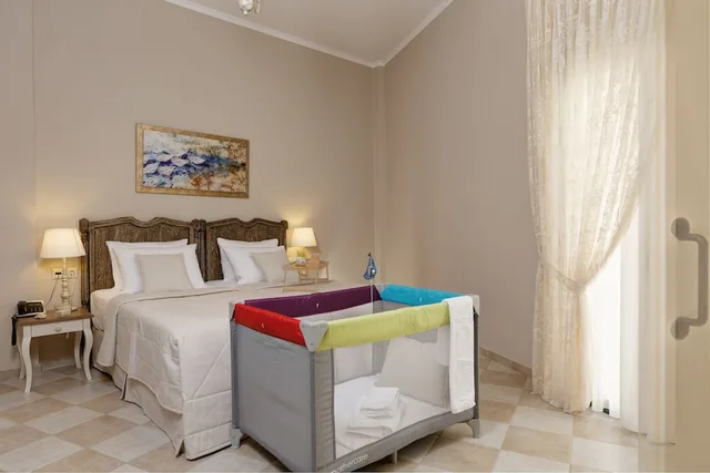 جناح سوبيريور بسريرين منفصلين بغرفة نوم واحدة مع أريكة، Ionia Suites 2/5