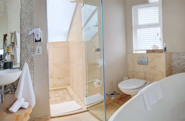 1 Bedroom, Standard, King Bed, Courtyard Area, Periwinkle Guest Lodge 3/3